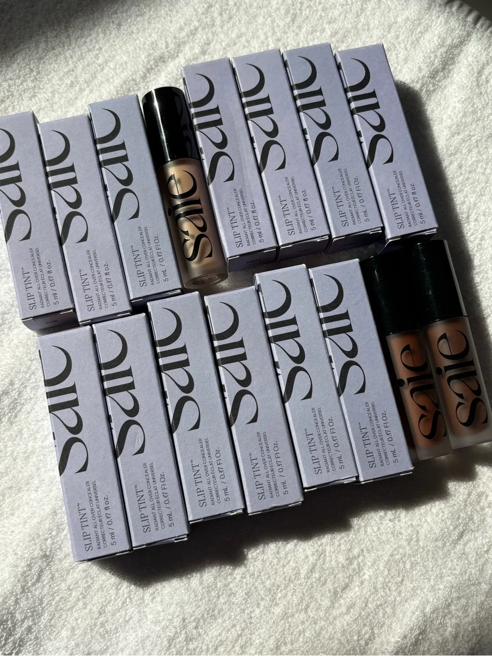 Saie Slip Tint Lipstick Collection — Nude and Warm Brown Shades